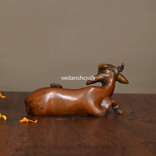 Brass Sitting Kamdhenu Cow Idol (3 Inch)