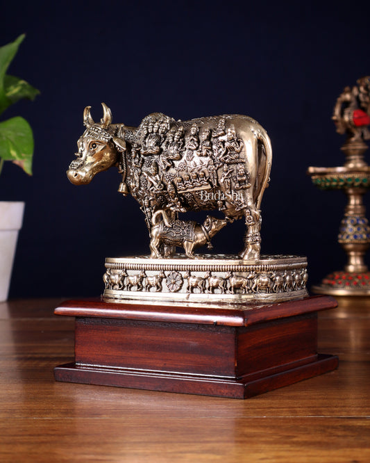 Brass Superfine Kamdhenu Cow with Calf – All Gods Engraved on Wooden Base (8.5 Inch)