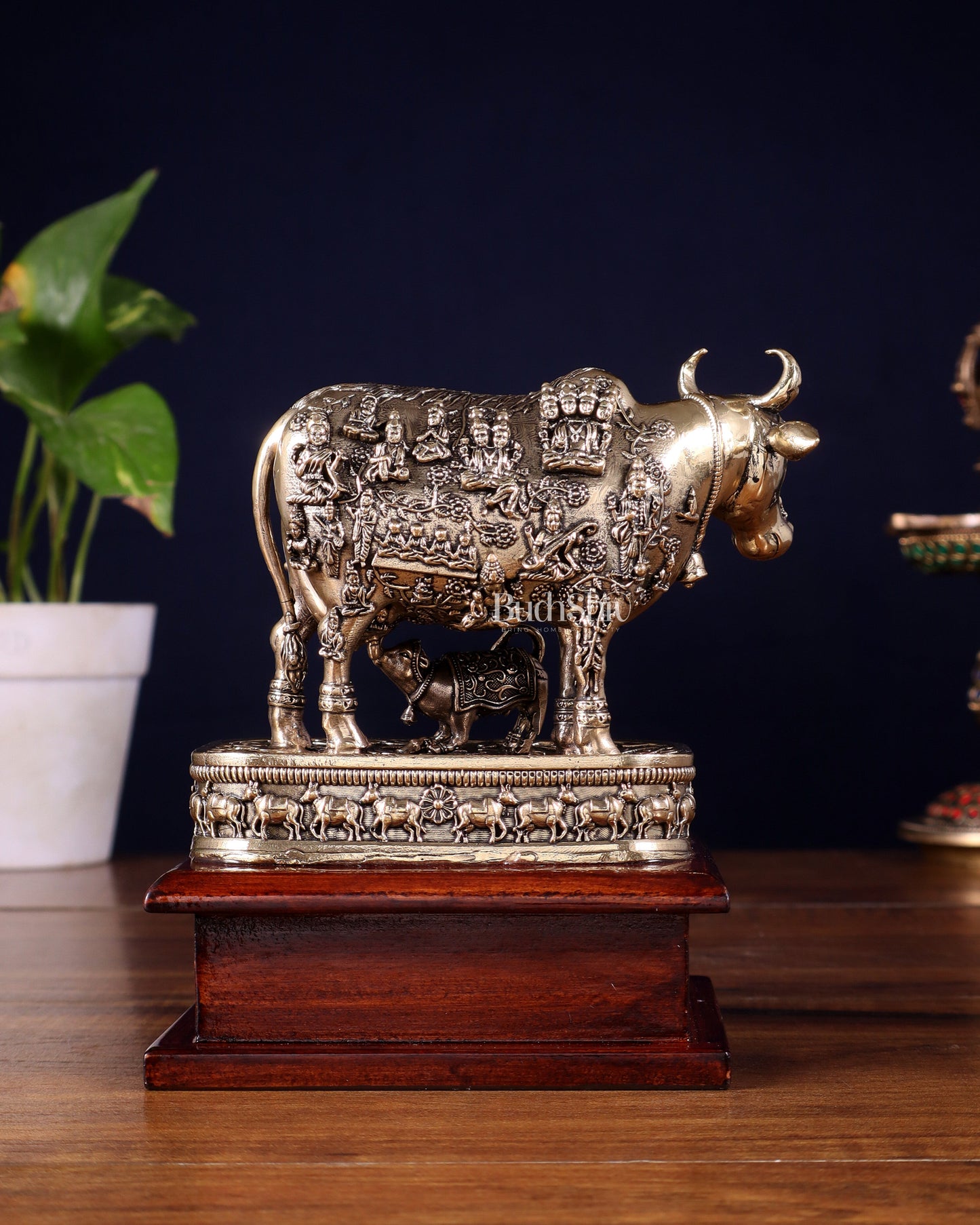 Brass Superfine Kamdhenu Cow with Calf – All Gods Engraved on Wooden Base (8.5 Inch)