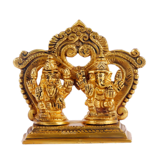 Brass small Ganesh Lakshmi idol with prabhavali frame 3.5"