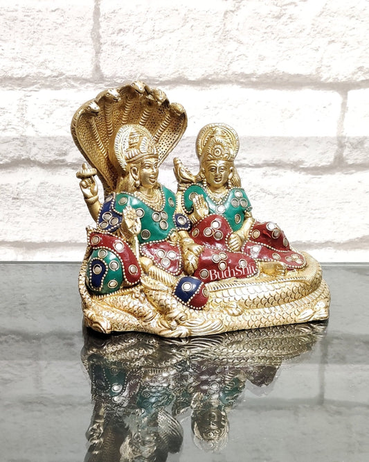 Lakshmi Narayan/ Vishnu Lakshmi brass idol resting on Sheshnaag Golden finish