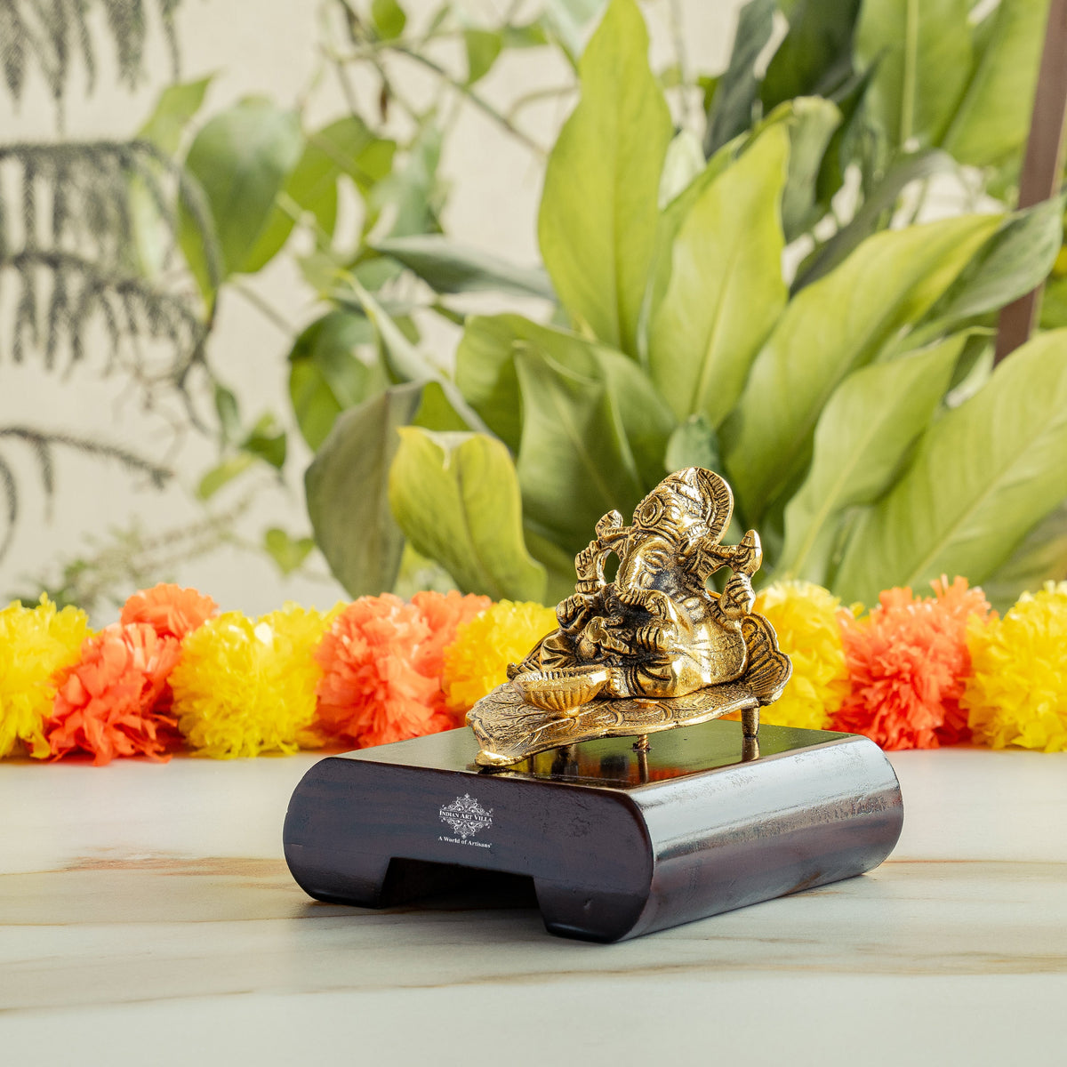 Brass Finish Ganesh Ji Sitting On Pan With Red Velvet Box