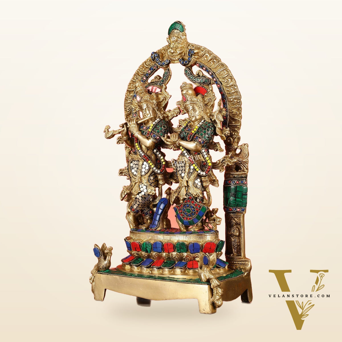 17.5-Inch Brass Radha Krishna Idol Pair with Peacock Adorned Base
