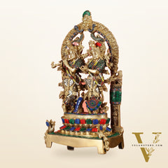 17.5-Inch Brass Radha Krishna Idol Pair with Peacock Adorned Base