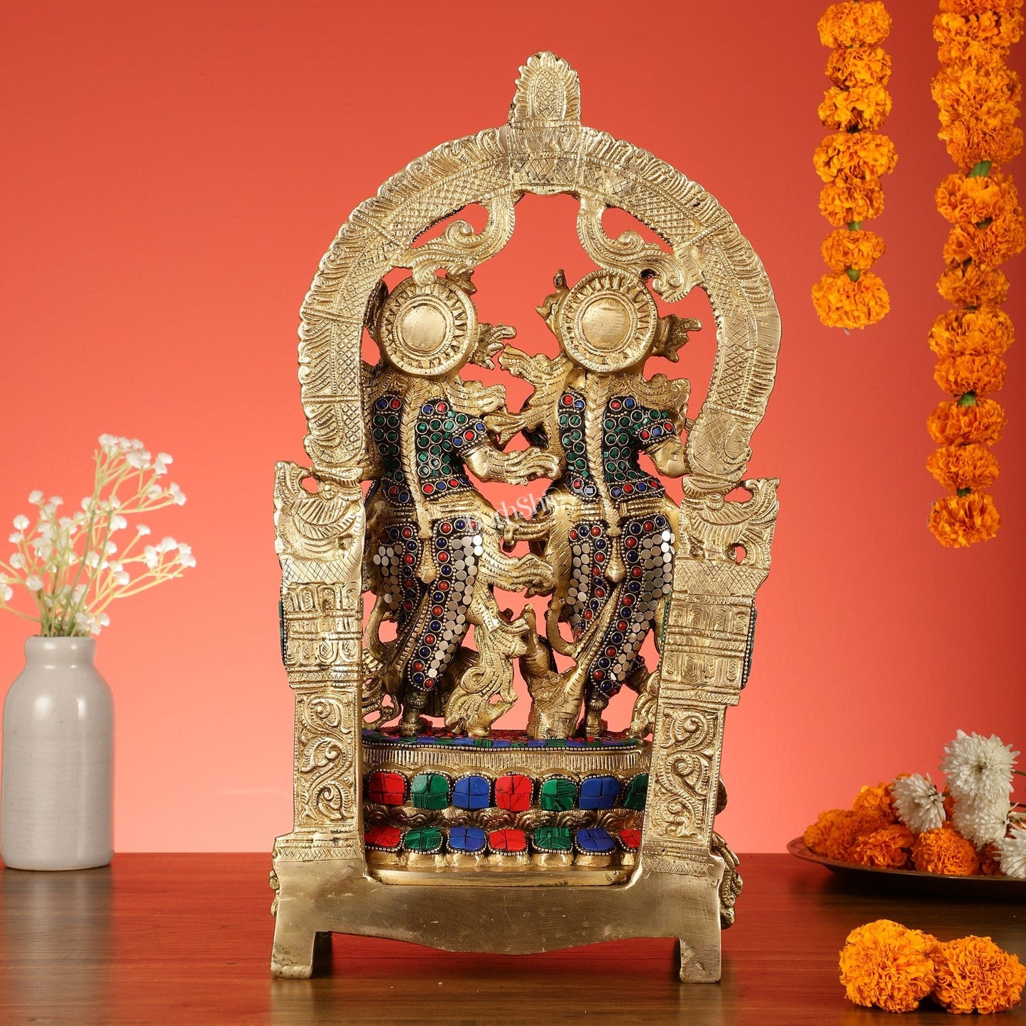 17.5-Inch Brass Radha Krishna Idol Pair with Peacock Adorned Base