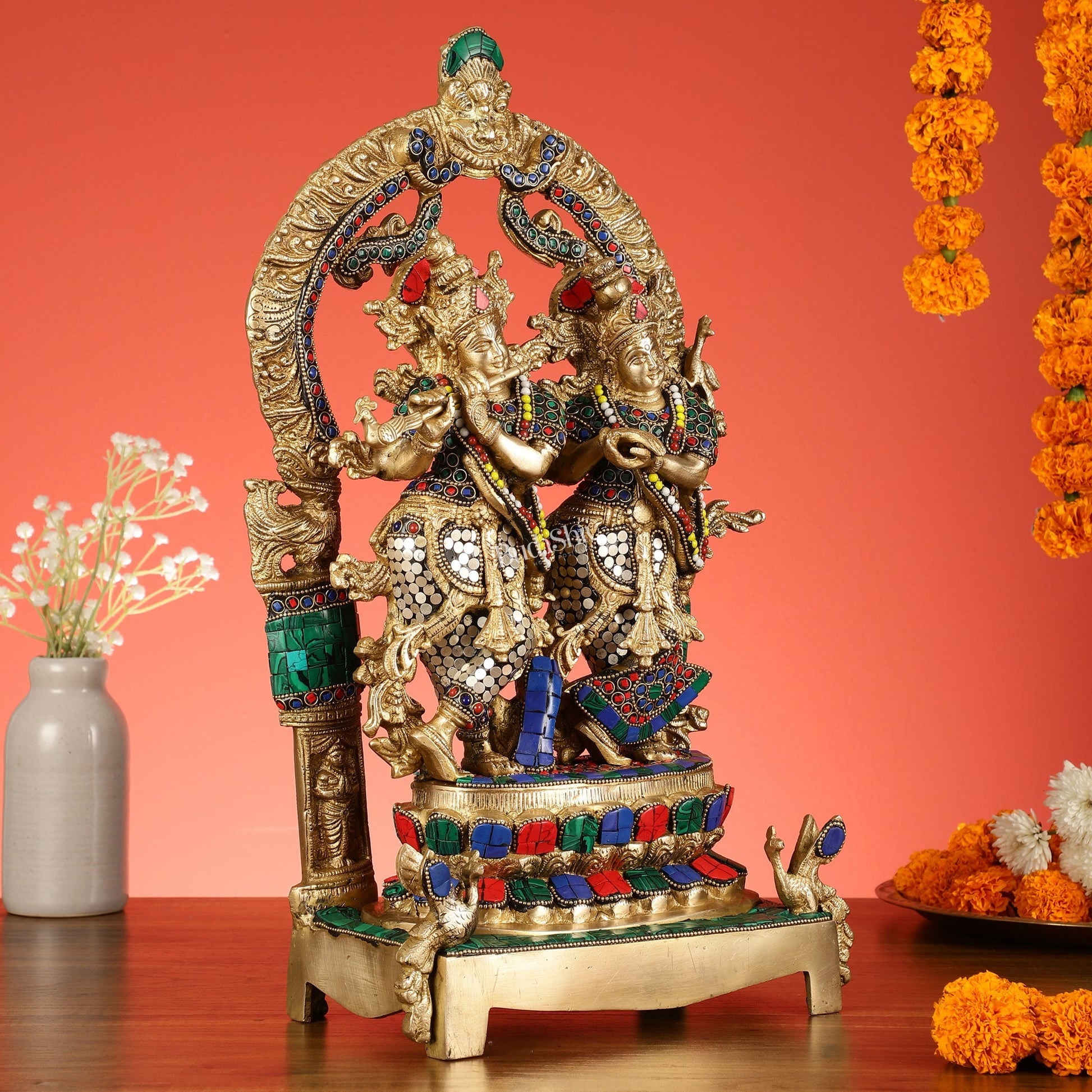 17.5-Inch Brass Radha Krishna Idol Pair with Peacock Adorned Base