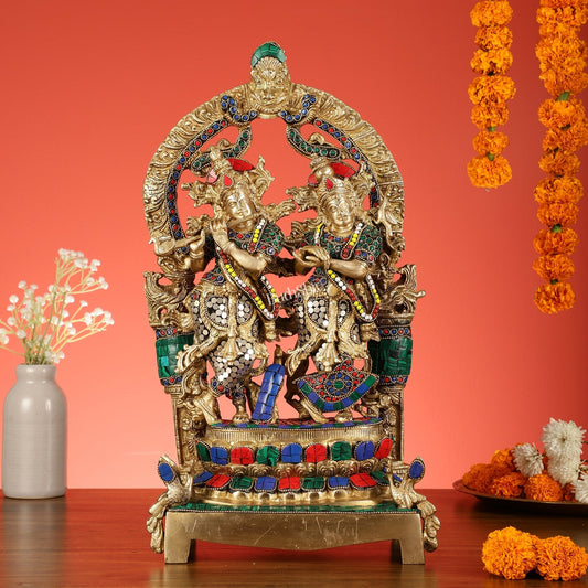 17.5-Inch Brass Radha Krishna Idol Pair with Peacock Adorned Base