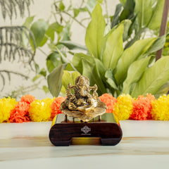 Brass Finish Ganesh Ji Sitting On Pan With Red Velvet Box