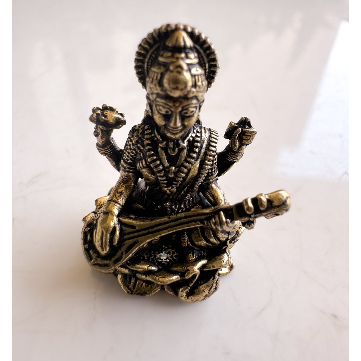 Pure Brass Miniature Saraswati Ji Murti Sitting On Lotus - 2.54 cm