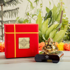 Brass Finish Ganesh Ji Sitting On Pan With Red Velvet Box
