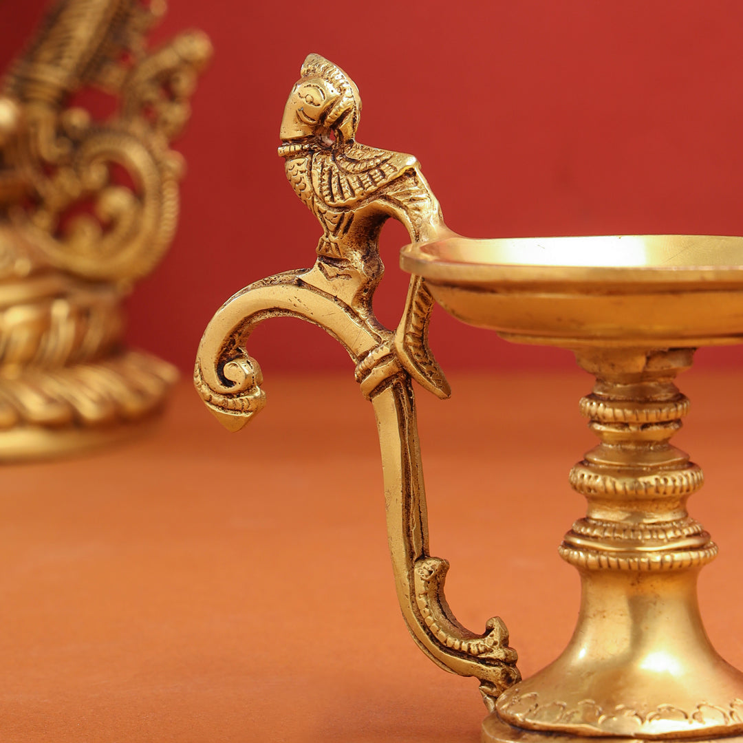 Brass Ethnic Peacock Diya With Handle (5 Inch)