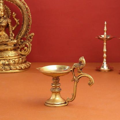 Brass Ethnic Peacock Diya With Handle (5 Inch)