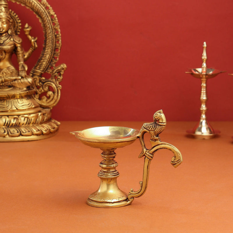 Brass Ethnic Peacock Diya With Handle (5 Inch)