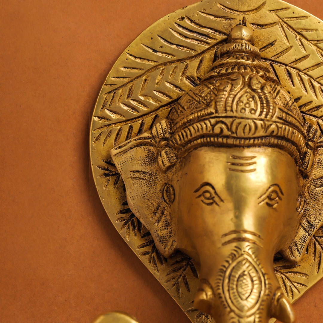 Brass Ganesha Bell On Leaf Wall Hanging (7.5 Inch)