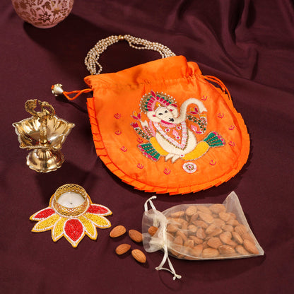 Brass Diya Ganesha Festive Potli/Hamper