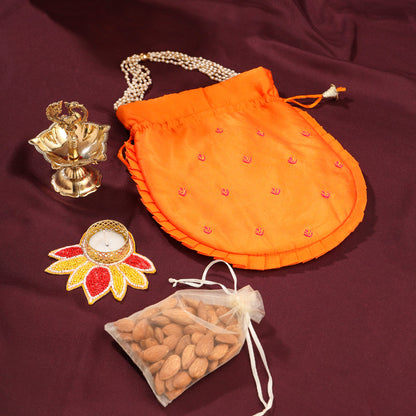 Brass Diya Ganesha Festive Potli/Hamper
