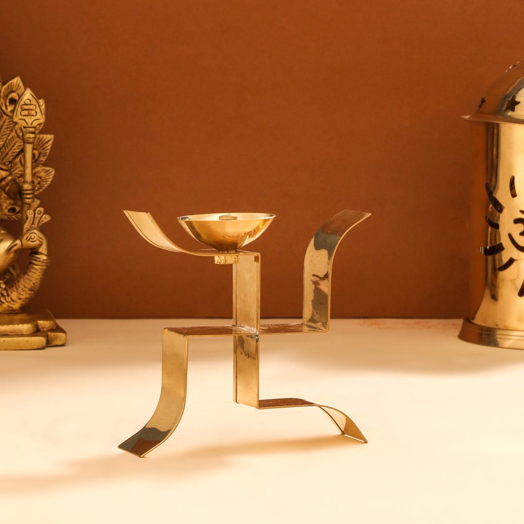 Brass Swastik Shape Akhand Diya (4 Inch)
