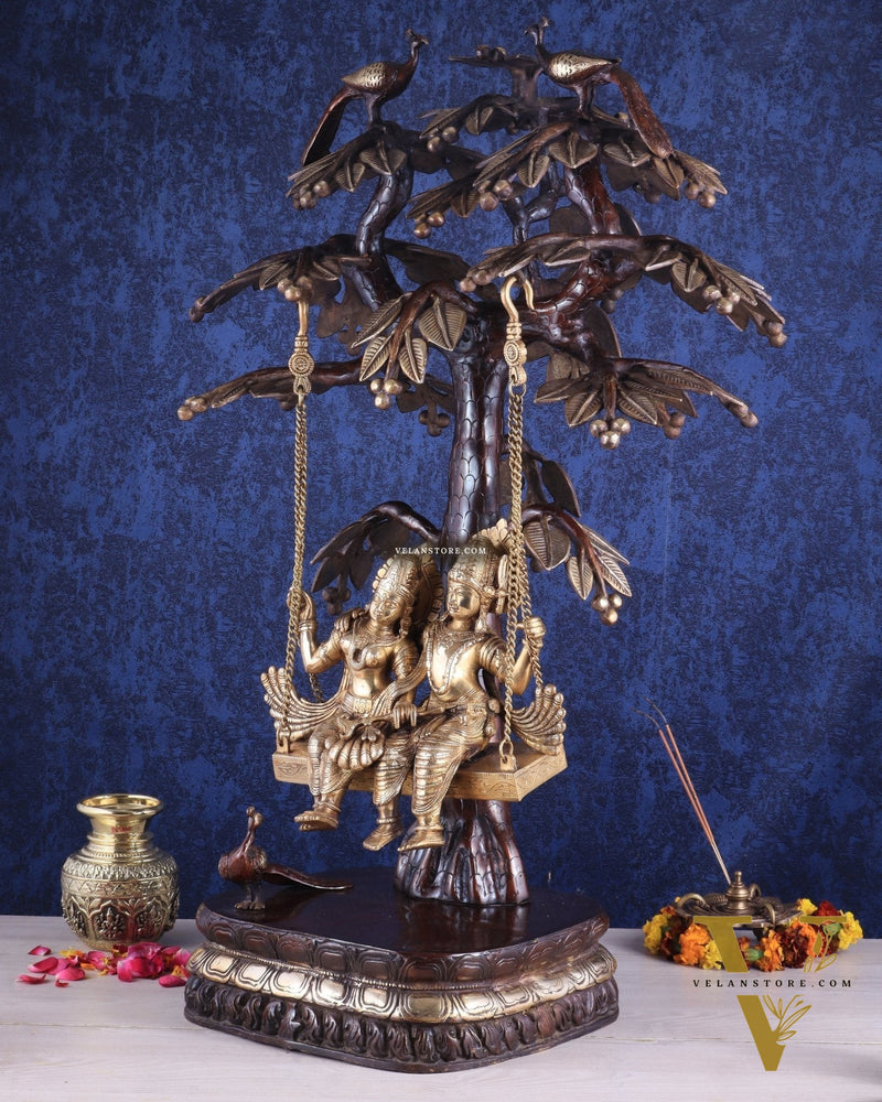 3-Foot Brass Radha Krishna Swing with Kalpavriksha and Peacock Motifs in Brown-Gold Finish