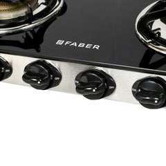 Faber Jumbo 4 Brass Burner Cooktop | 1 Jumbo, 2 Medium, 1 Small | Drip Tray | Toughened Glass | SS Finish | Ergonomic Kn