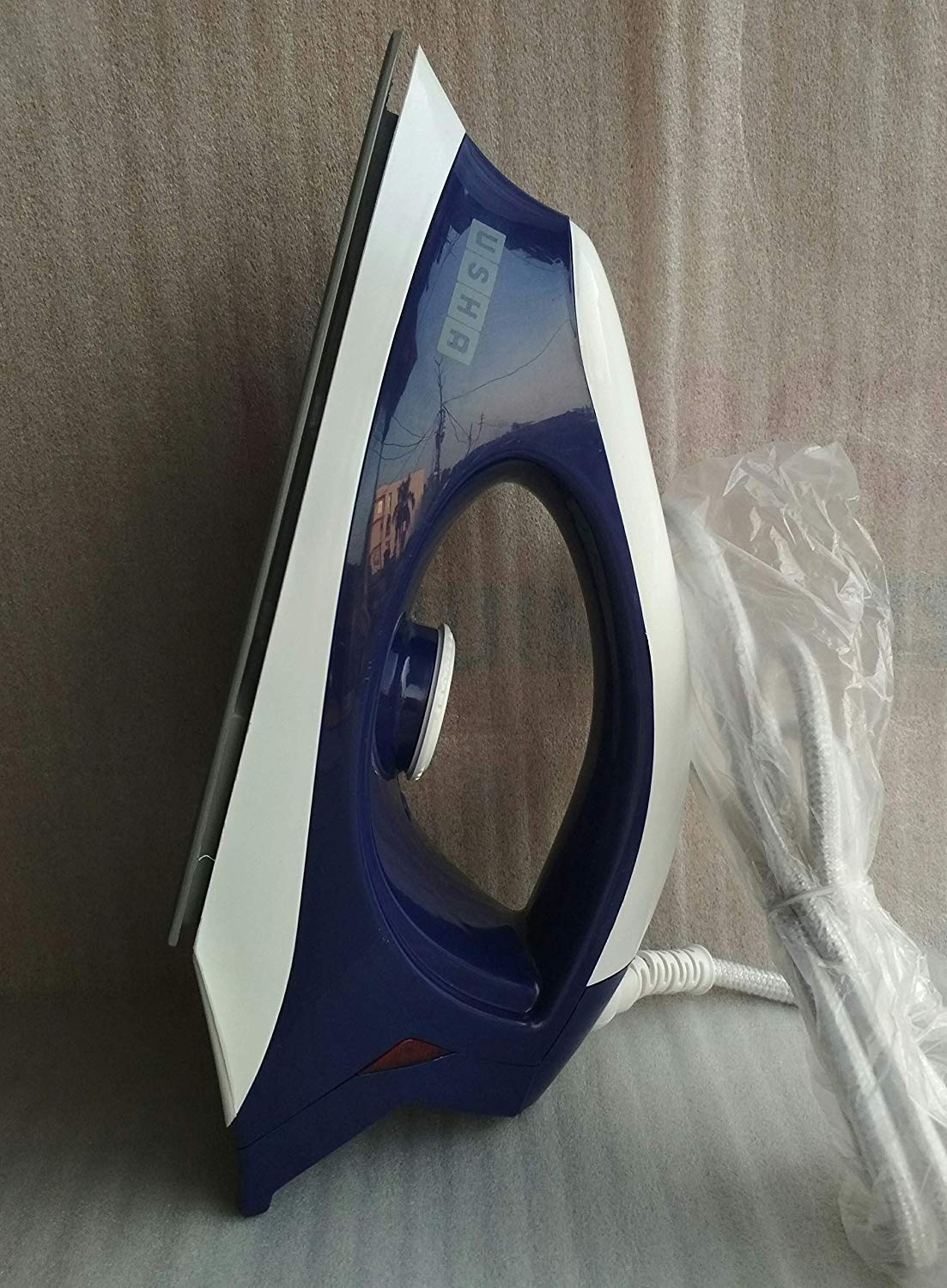 USHA 3702 1000 Watts Dry Iron with Shock Proof Plastic Body | Single Coat Grey Non Stick Soleplate for Longer Durability |Overheat Safety Shutoff | 360° Swivel Cord | 2 Years Warranty | Blue & White