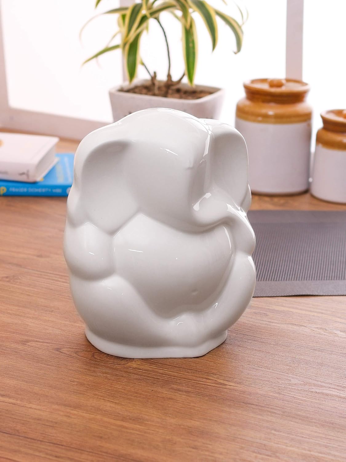 Clay Craft The Basics Lord Ganesha Ceramic Statue is a and Home Decor Item.