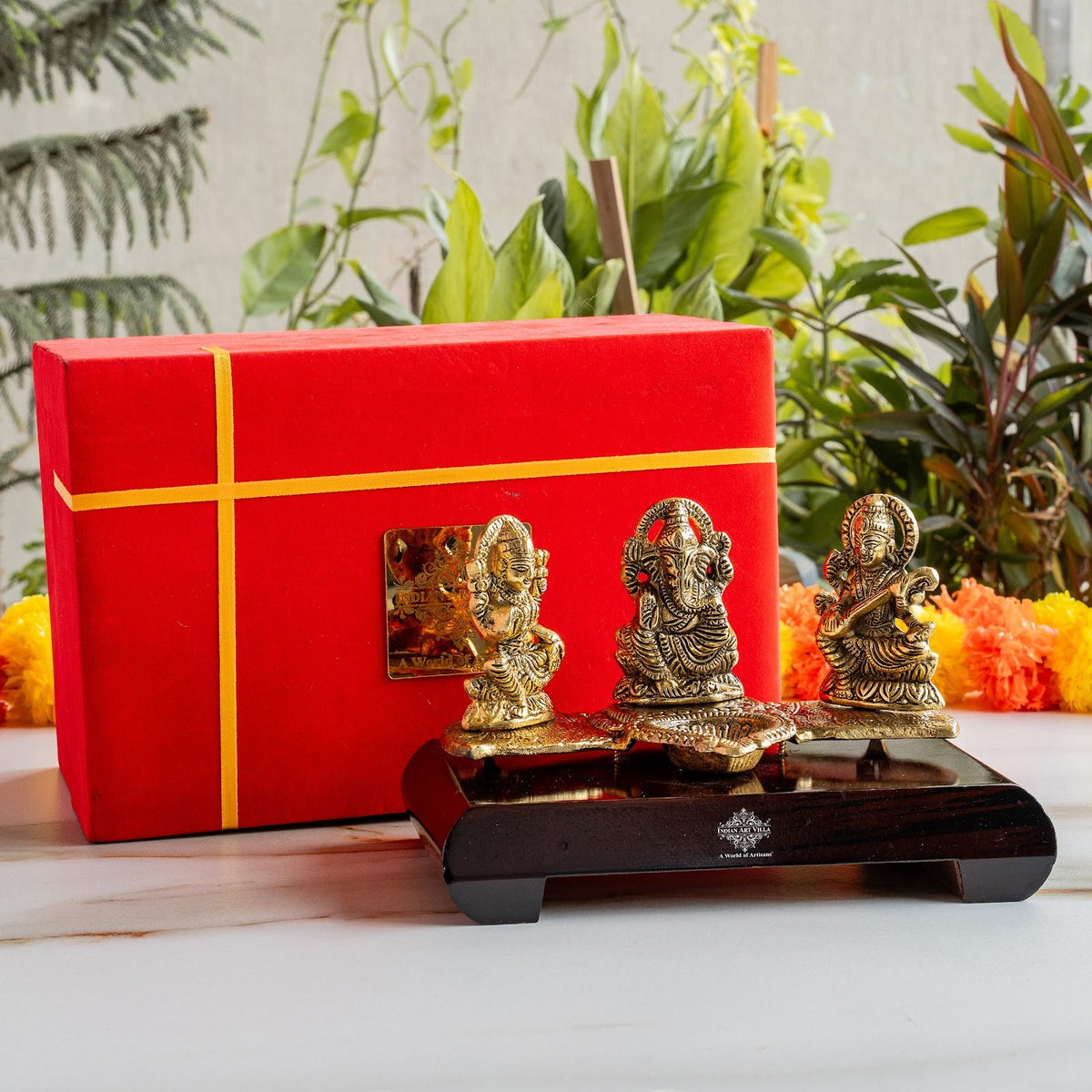 Brass Finish Ganesh Ji Laxmi JI & Saraswati Ji Murti On Wooden Base