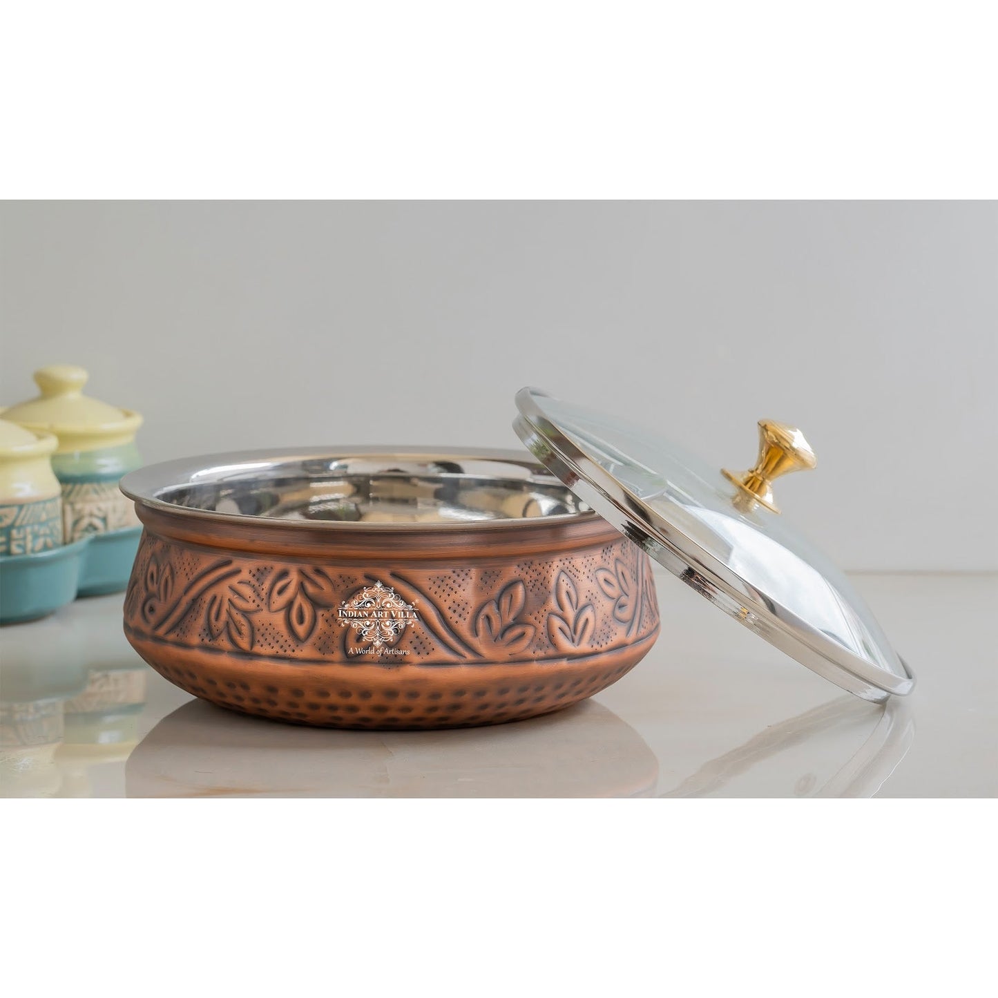 Premium Steel Copper Handi with Antique Finish, Intricate Embossed Design, and Glass Lid - Perfect for Serveware And Tableware.