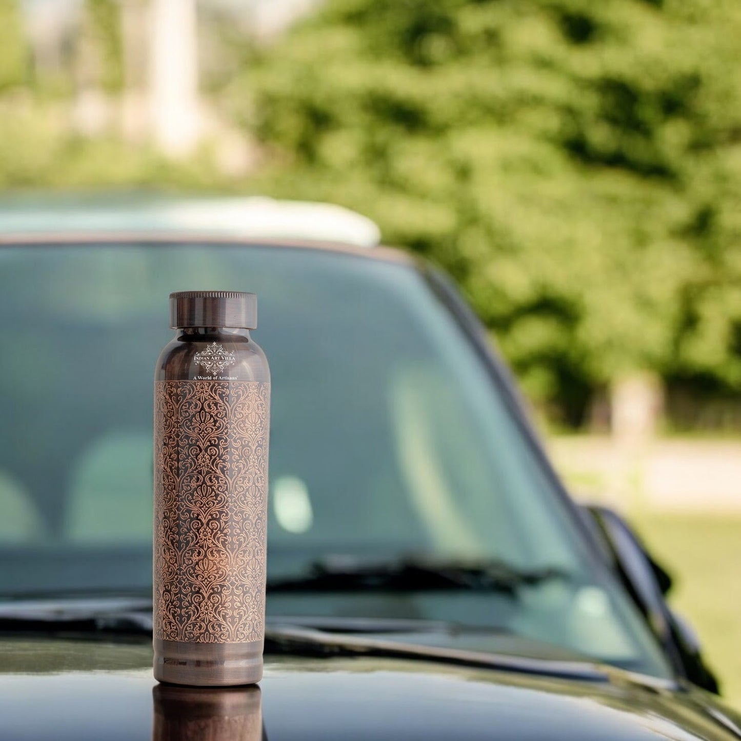 Pure Copper Drinkware Bottle with Antique Dark Embossed Design – 900 ML