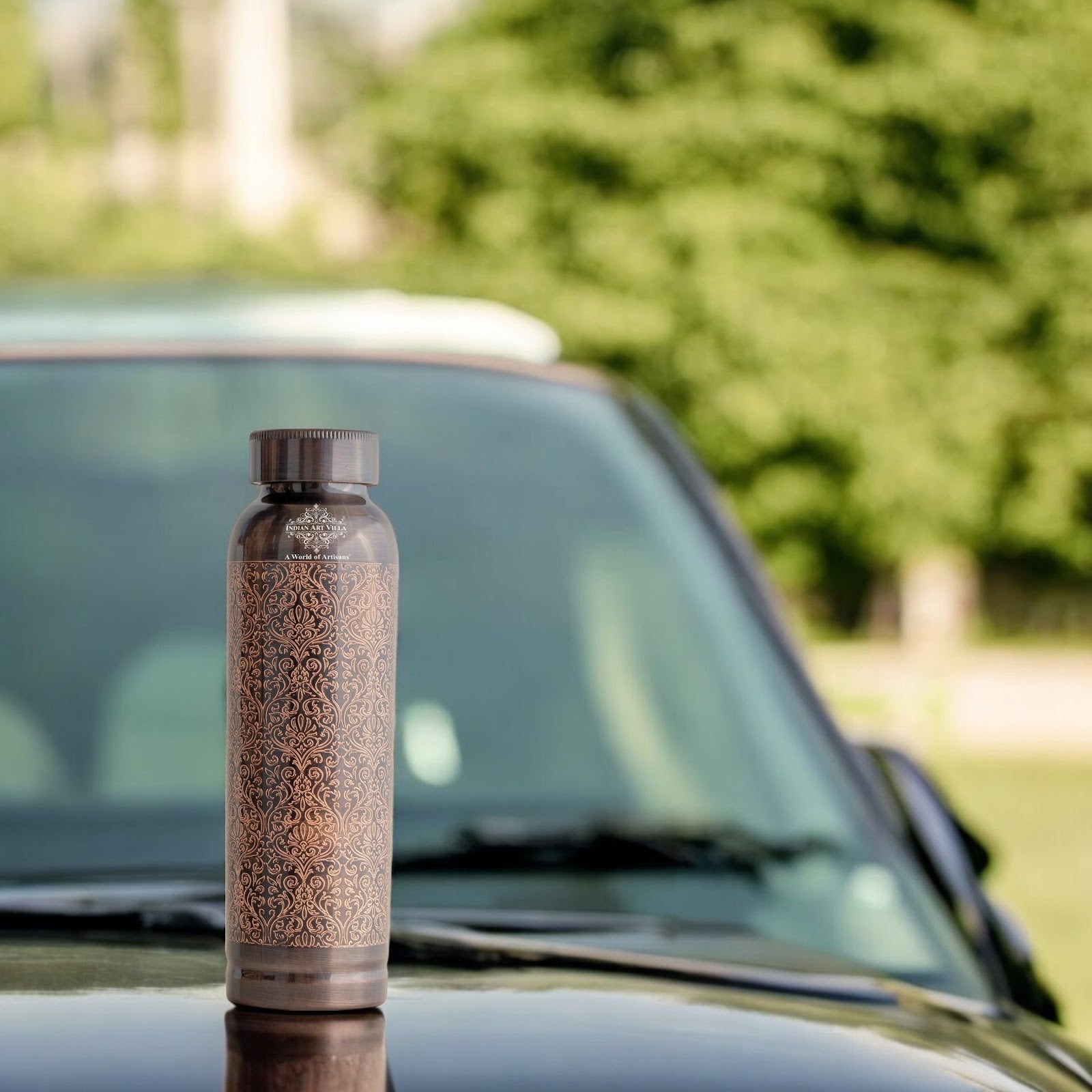 Pure Copper Drinkware Bottle with Antique Dark Embossed Design – 900 ML