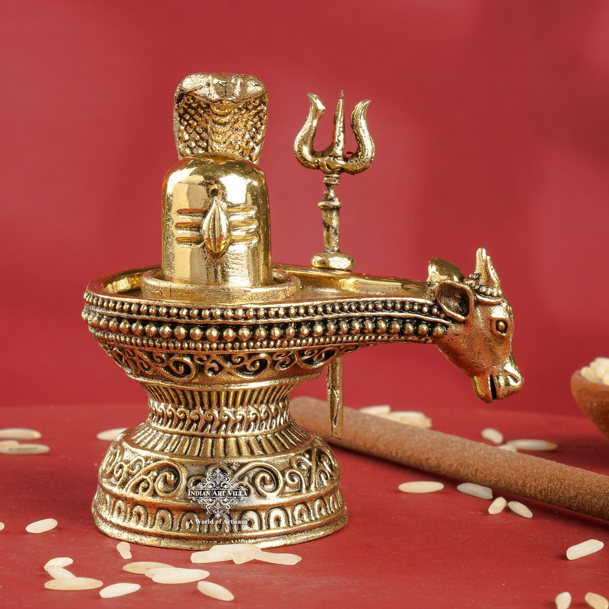 Brass Shivling with Nandi Face & Trishul – Decorative Spiritual Idol