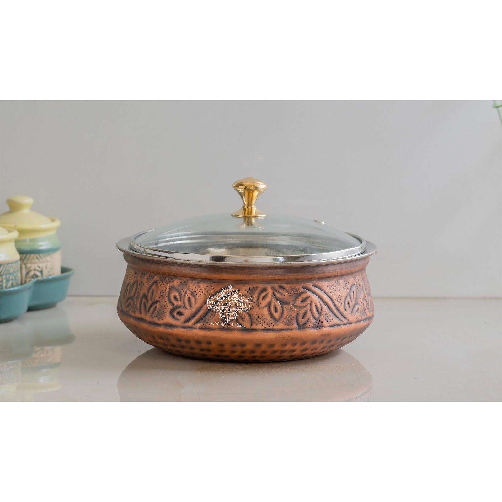 Premium Steel Copper Handi with Antique Finish, Intricate Embossed Design, and Glass Lid - Perfect for Serveware And Tableware.