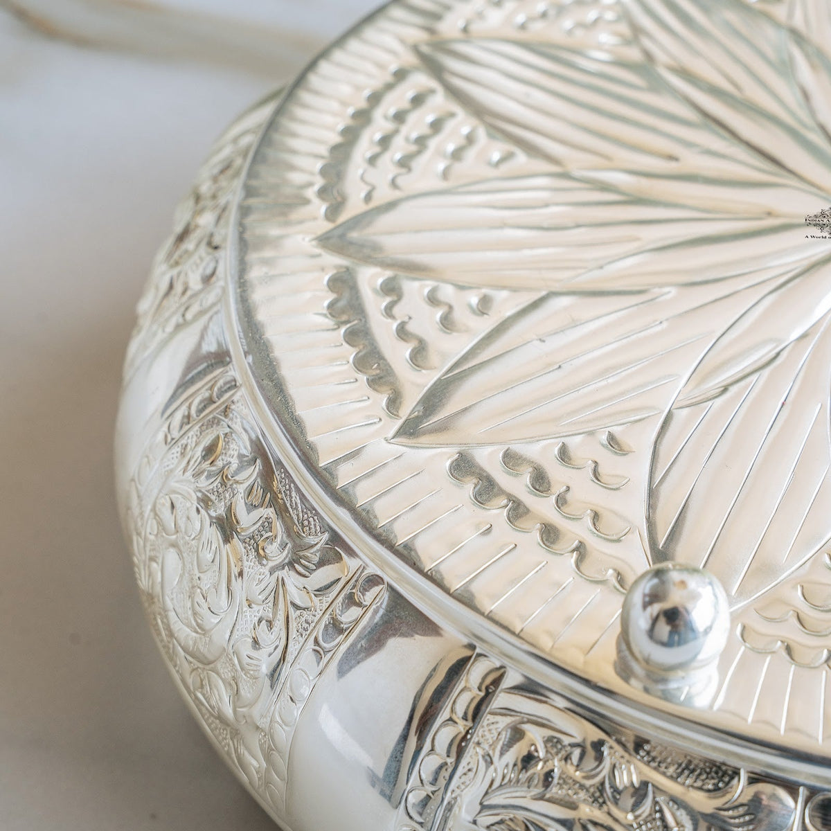 Silver Plated Embossed Scalloped Urli with Lotus Design For Home décor