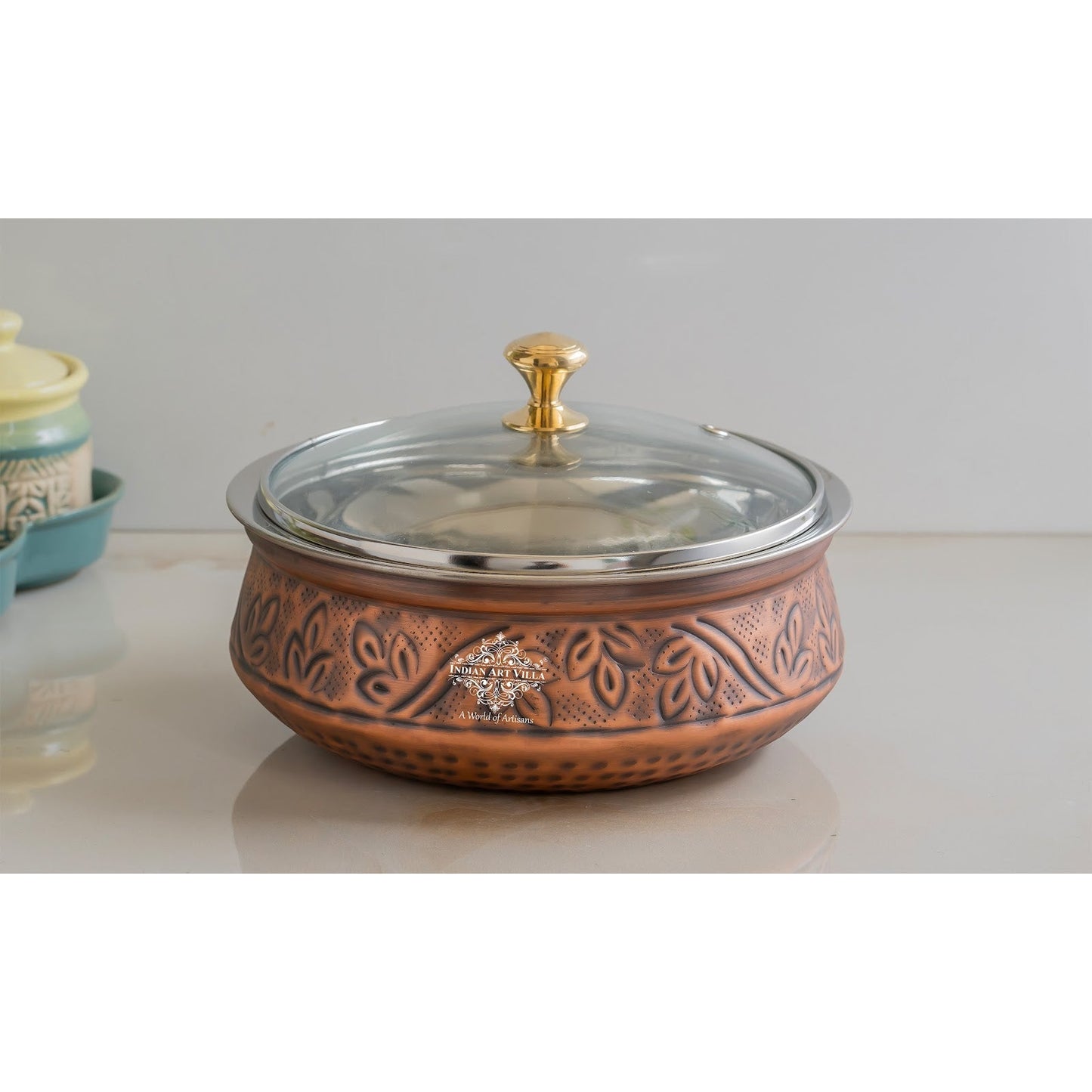Premium Steel Copper Handi with Antique Finish, Intricate Embossed Design, and Glass Lid - Perfect for Serveware And Tableware.