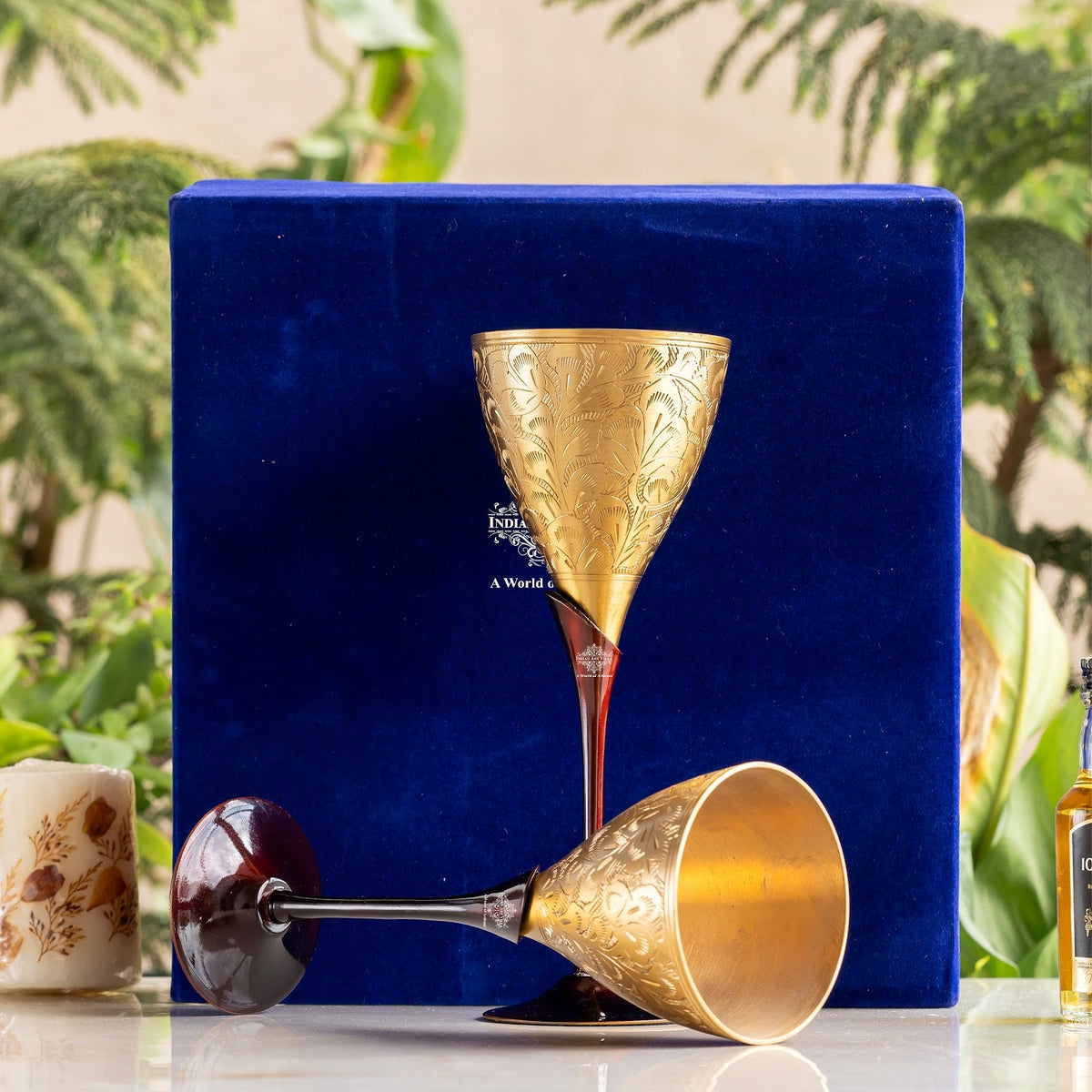 Brass champagne Embossed Glass With Black Bottom Stand - 200 ML