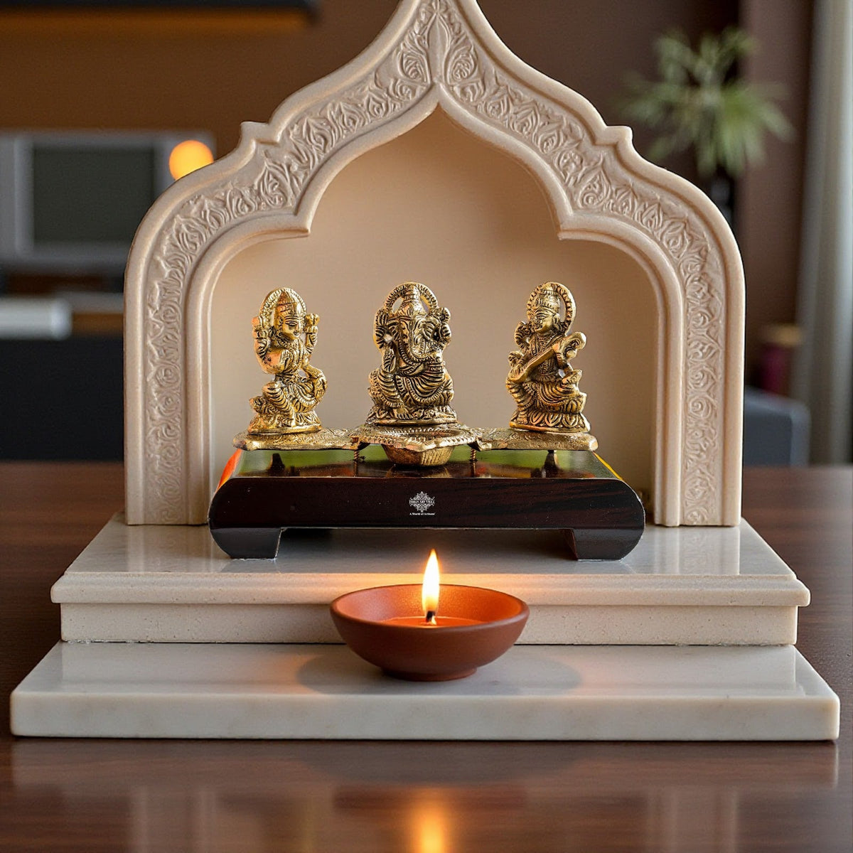 Brass Finish Ganesh Ji Laxmi JI & Saraswati Ji Murti On Wooden Base