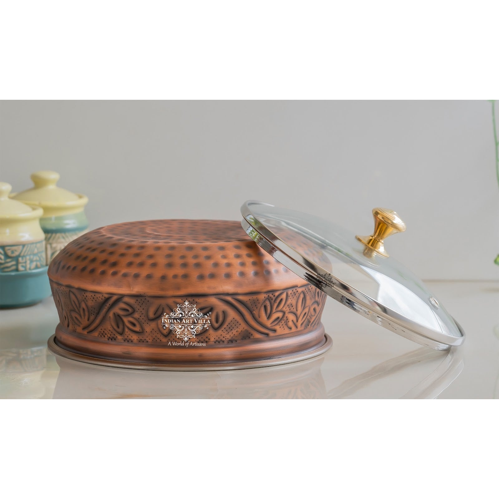 Premium Steel Copper Handi with Antique Finish, Intricate Embossed Design, and Glass Lid - Perfect for Serveware And Tableware.
