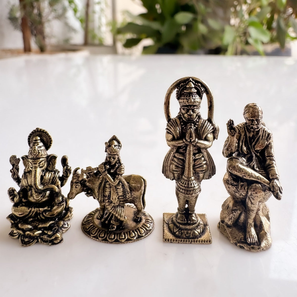 Pure Brass Miniature Divine Idol Combo of Ganesha, Krishna, Hanuman ji & Sai Baba