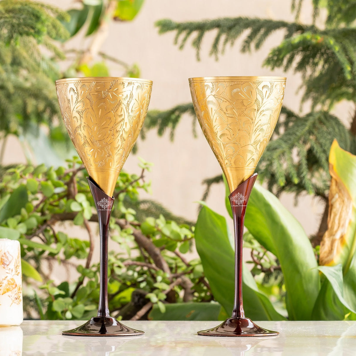 Brass champagne Embossed Glass With Black Bottom Stand - 200 ML