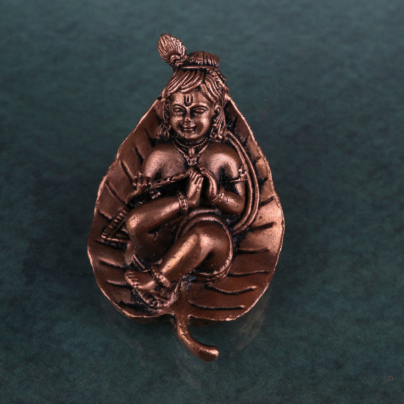 Copper Bal Krishna on Leaf Idol, Handcrafted Tamra Gopala Murti, Pure Tamraloha Baby Krishna Statue for Pooja, Home Decor, Brown, 1 Inch, 1 Piece