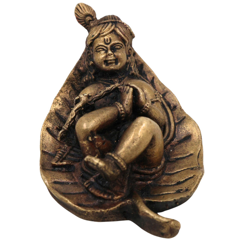 Brass Bal Krishna on Leaf Idol, Peetal Baby Gopala Murti, Handcrafted Govinda Kanha Statue for Pooja Home Decor, Gold, 1 Inch, 1 Piece