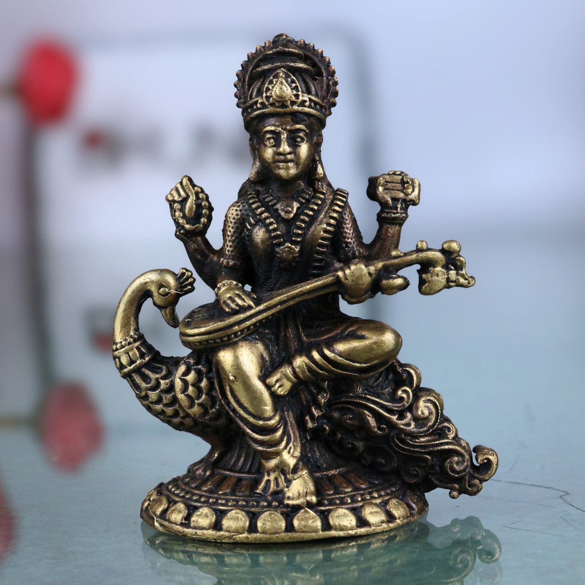 Brass Saraswati Idol, Handcrafted Peetal Sharada Devi Murti, Vagdevi Moorthi, Bharati Hamsavahini Statue, Kalaivani Brass Figurine for Pooja, Home Decor & Gift, Gold, 2.5 Inch, 1 Piece