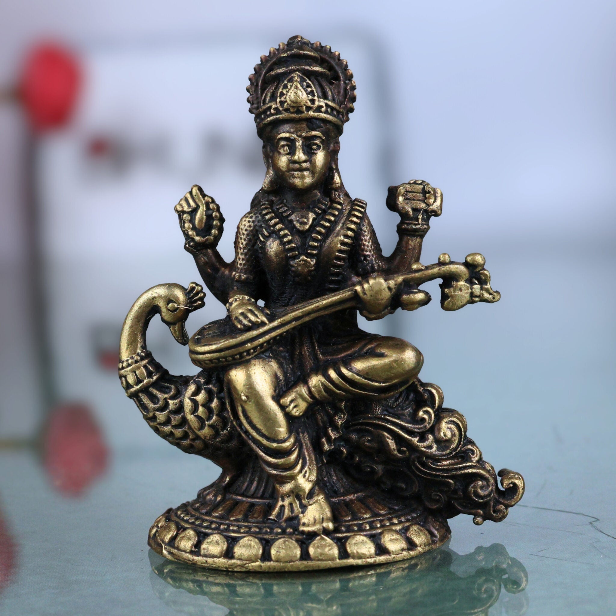 Brass Saraswati Idol, Handcrafted Peetal Sharada Devi Murti, Vagdevi Moorthi, Bharati Hamsavahini Statue, Kalaivani Brass Figurine for Pooja, Home Decor & Gift, Gold, 2.5 Inch, 1 Piece