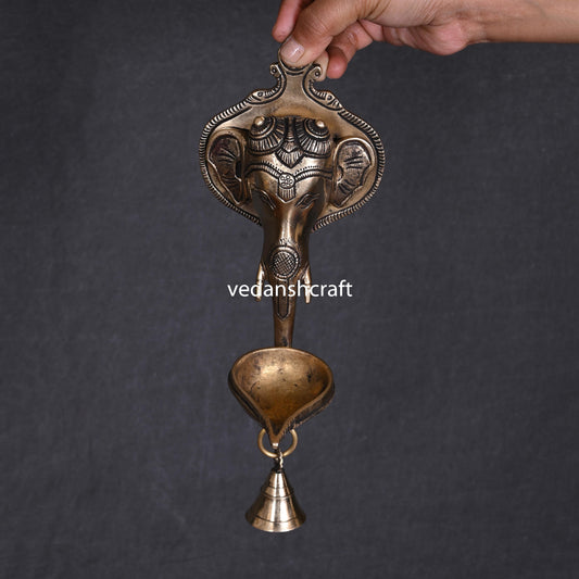 Brass Ganesha Face With Diya & Bell Wall Hanging (10 Inch)