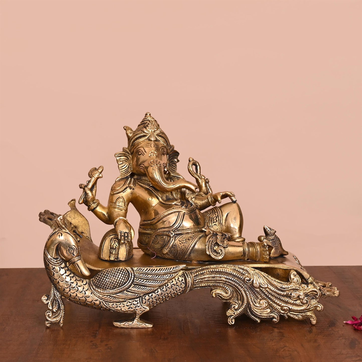Brass Ganesha Resting On Peacock Couch (7.7 Inch)