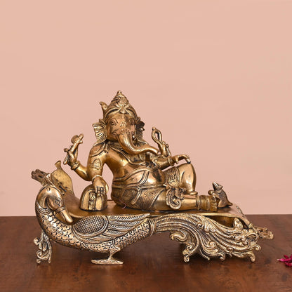 Brass Ganesha Resting On Peacock Couch (7.7 Inch)