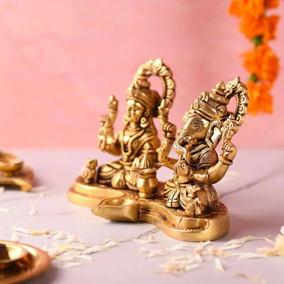 Brass Ganesha and Lakshmi Sitting Idol With Diya (5 Inch)