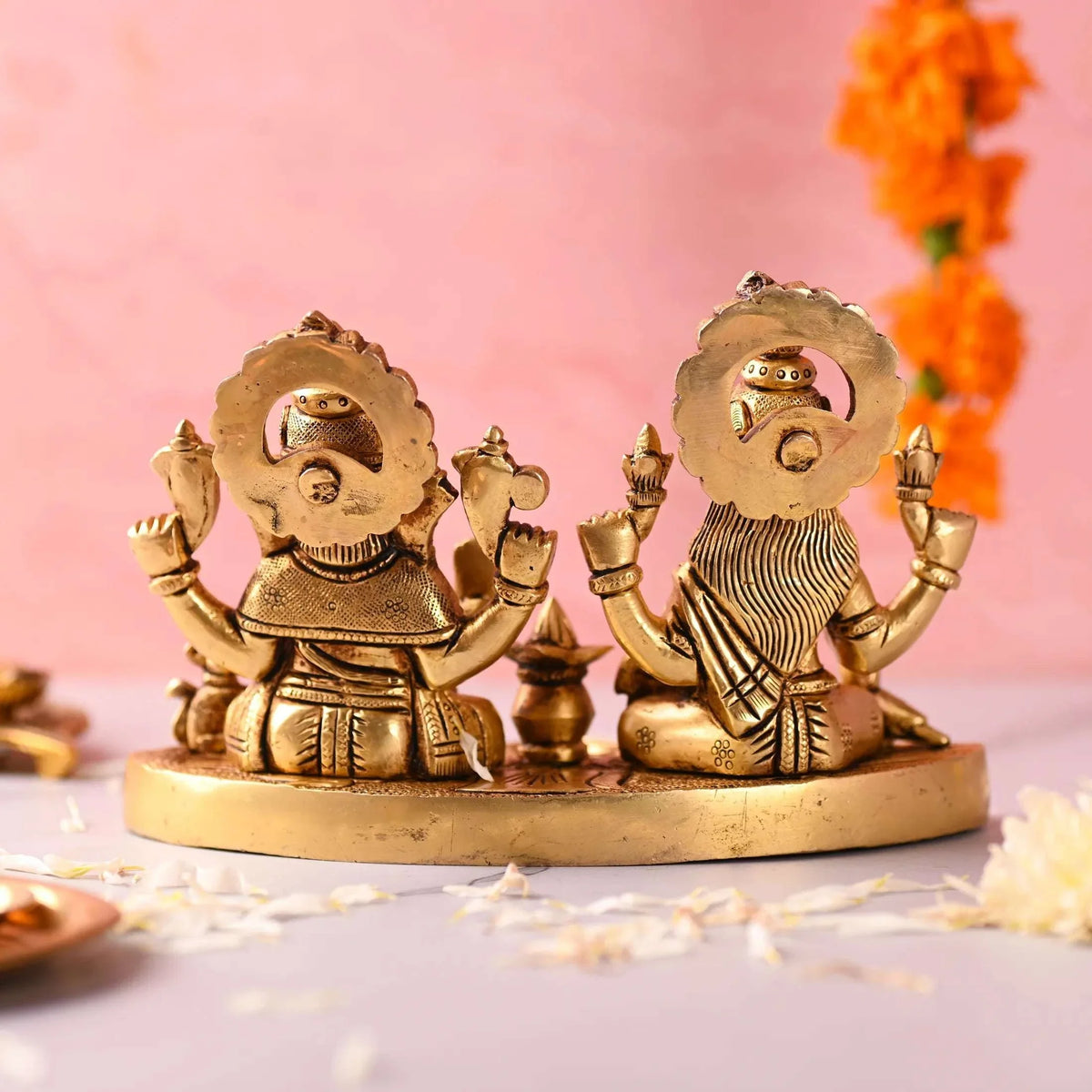 Brass Ganesha and Lakshmi Sitting Idol With Diya (5 Inch)