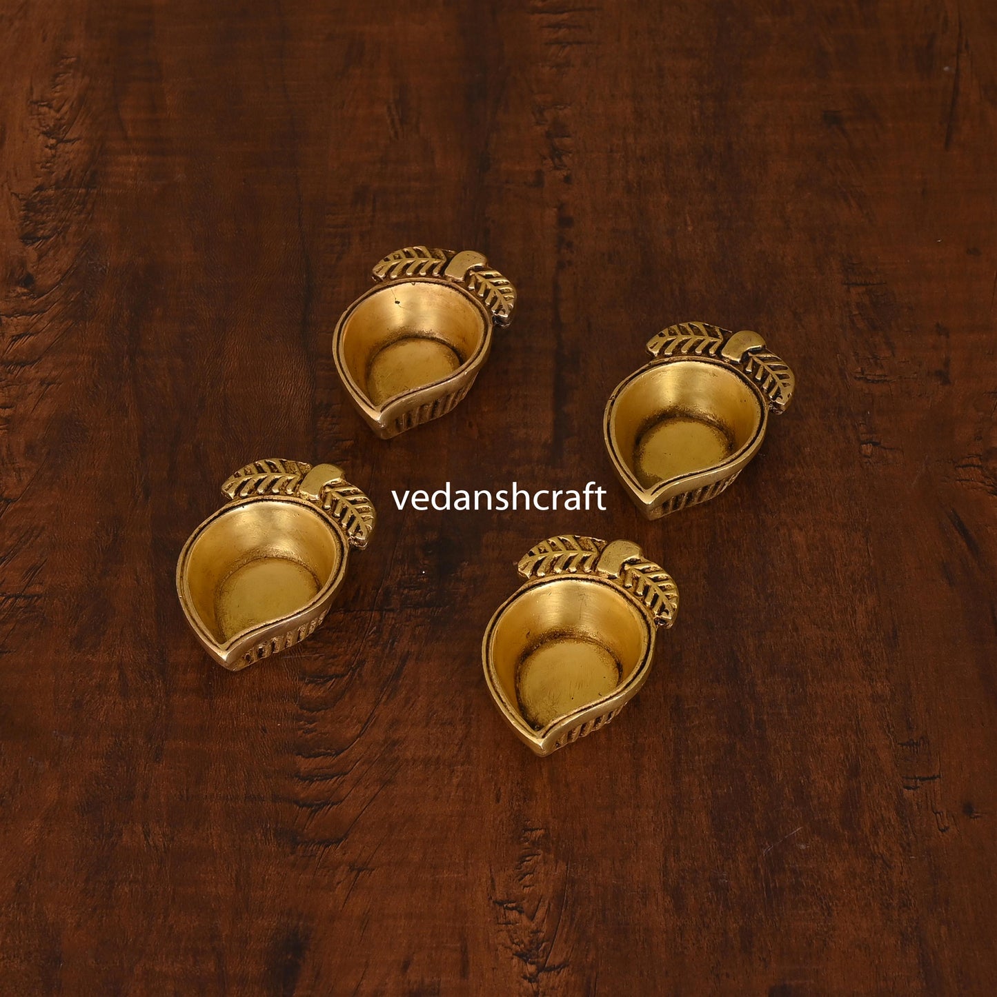 Brass Mango Shape Diya Set Of Four