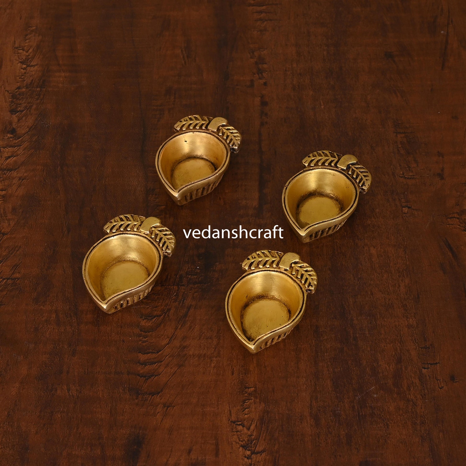 Brass Mango Shape Diya Set Of Four