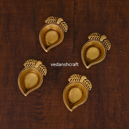 Brass Mango Shape Diya Set Of Four